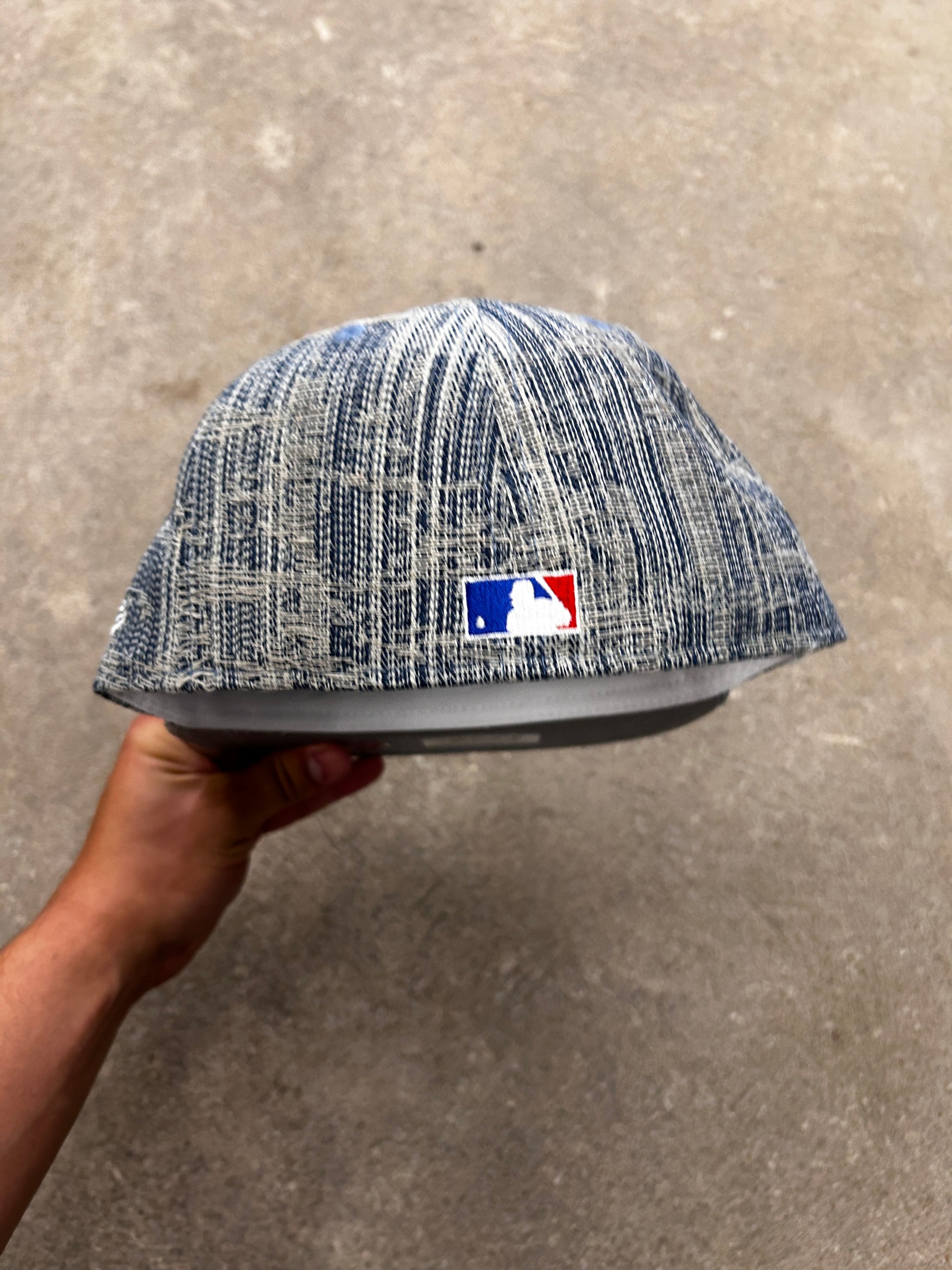 Distressed denim New Era cap